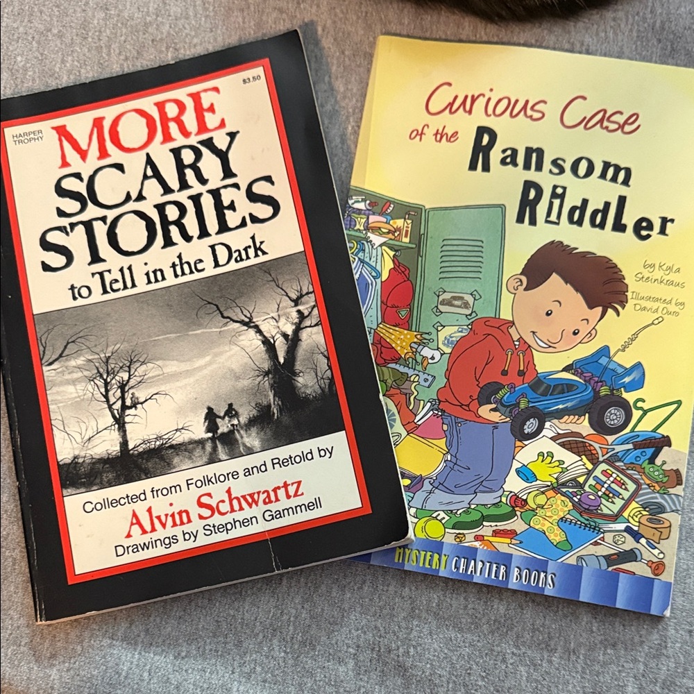 2 paperbacks- More Scary Stories and Curious Case of the Ransom Riddler Books